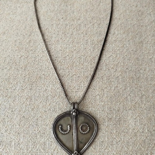 Vintage necklace with 925 silver chain and large ethnic pendant used