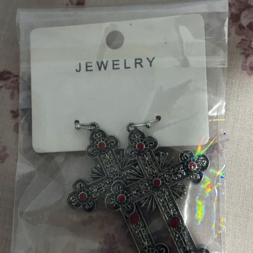 Cross earrings like new with red phosphorescent details