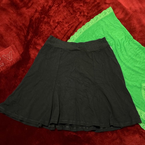 Women's set of 2 pieces used, black BSB skirt and green Voyelles lace top