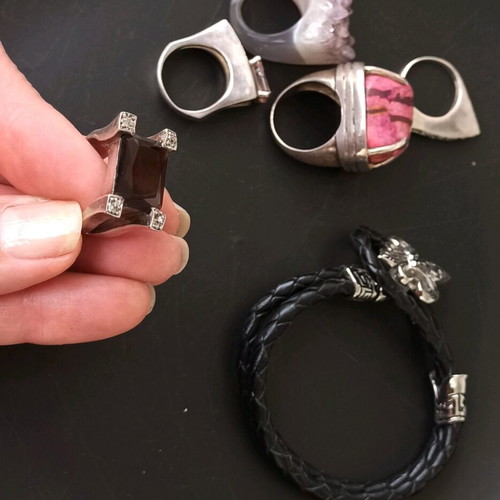 Silver ring with dark brown stone used