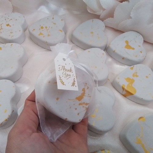 32 scented plaster hearts with gold splatter design