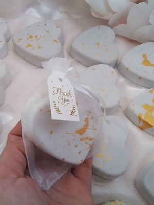 32 scented plaster hearts with gold splatter design