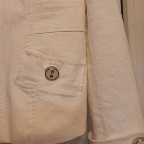Women's jacket used white cotton with silver buttons