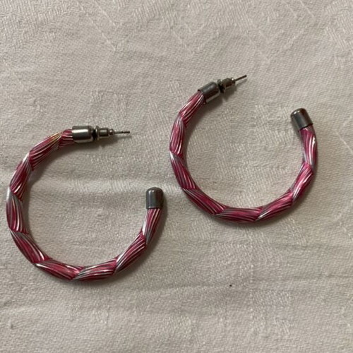 Hoop earrings like new with pink and silver embossed design