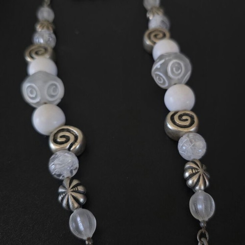 Women's necklace with silver chain and beads