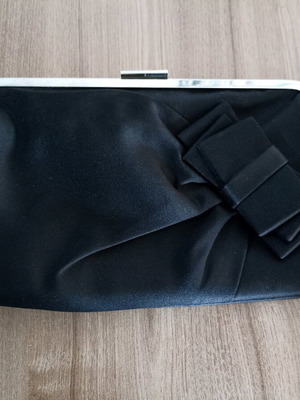 Black hand clutch bag with bow like new