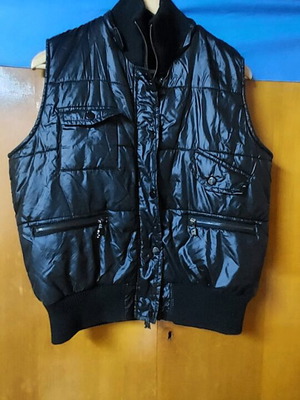 Women's sleeveless jacket black size XL like new