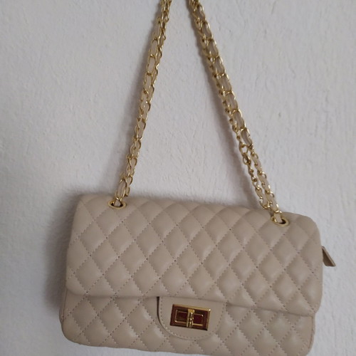 Women's beige handheld bag unused