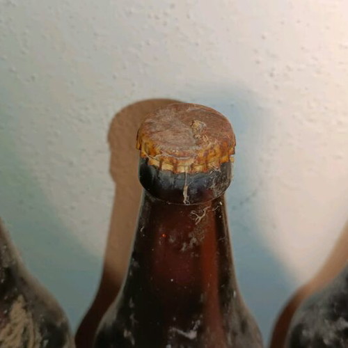 Vintage Amstel beers pack with sealed bottles