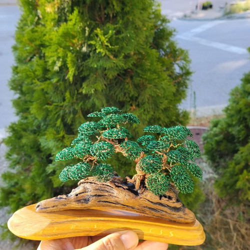 Unique bonsai made of copper wire and wood