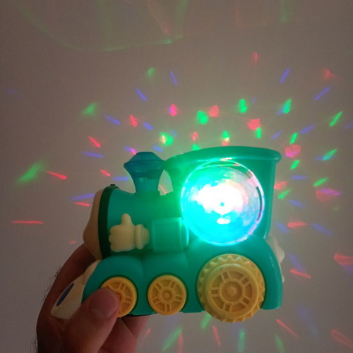 Cute Train toy with sounds, lights and movement, used