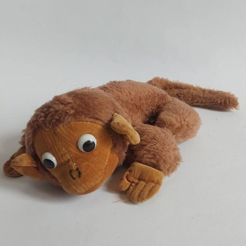 Plush monkey toy used