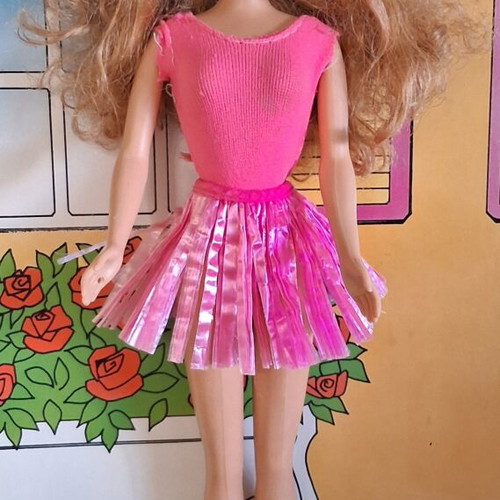 Vintage Barbie doll with clothes