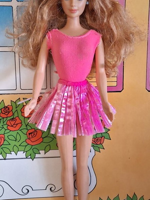 Vintage Barbie doll with clothes