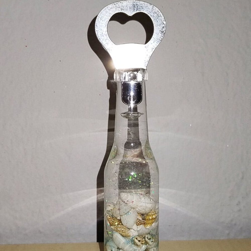 Bottle opener from Limnos like new with shells and glitter