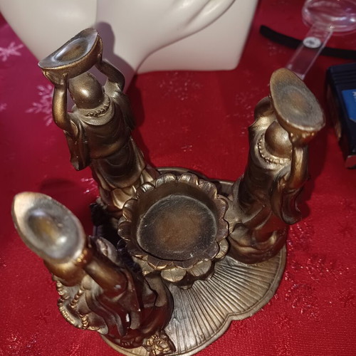 Asian candlestick with 3 smiling figures used, bronze finish