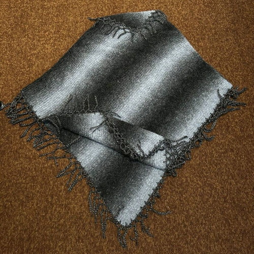 Handmade knitted poncho unused