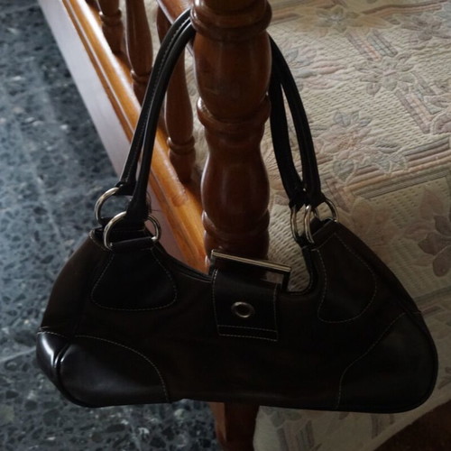 Women's black shoulder bag like new with metal clasp