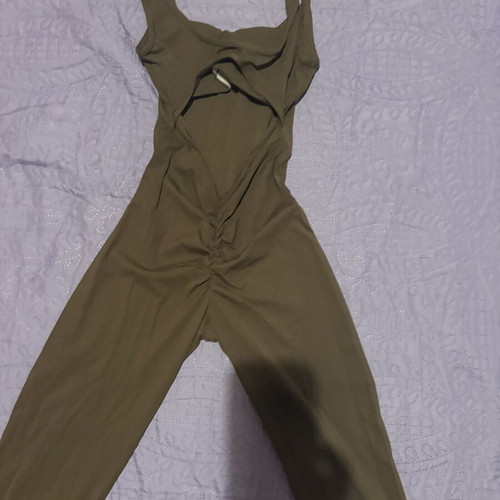 Gym Jumpsuit new with bell-bottom opening and open back, size S