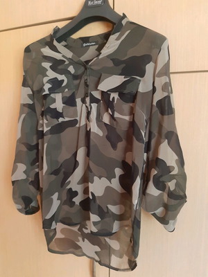 Shirt used size S with semi-transparent fabric and oversized fit