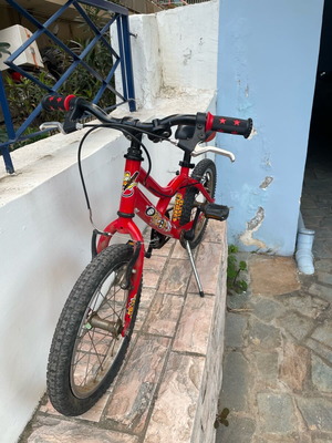 Children's bicycle used, red BMX with V-Brakes