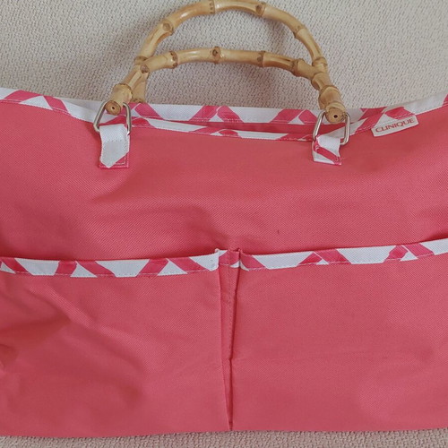 Clinique Limited Edition handbag, coral pink with white geometric pattern and bamboo handles