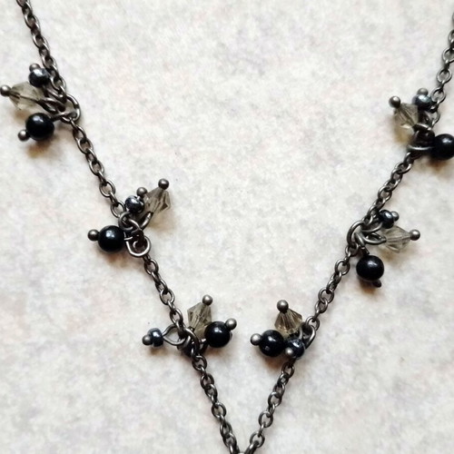 Women's chain necklace with black stones and zircon