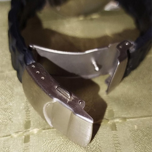 Newman watch used with blue dial and white crystals