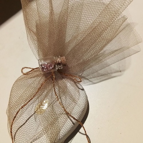 Wedding favors scented plaster heart with gold leaf and glass bottle