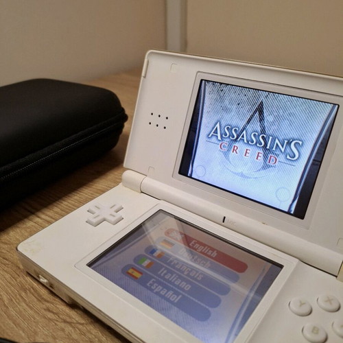 Nintendo DS Lite White like new with Assassin's Creed game