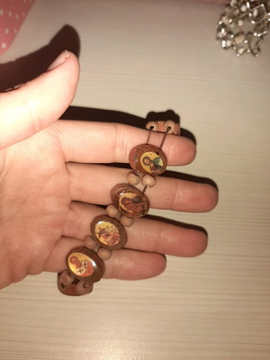 Bracelet with saint images like new with elastic cord