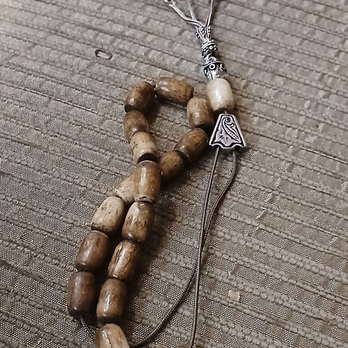 Worry beads made of bone used with oriental elements