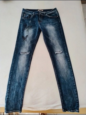 Jeans like new, blue with butterfly design, size L