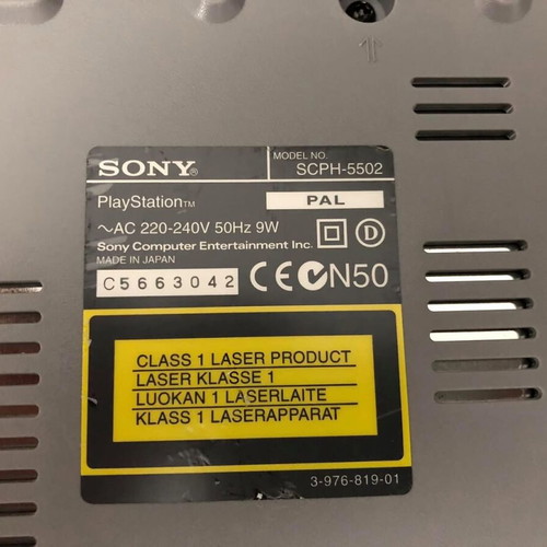 Sony PlayStation console used with official bag, controller and cables