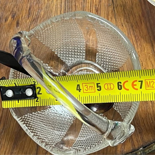 Two small glass baskets with spoon for caviar used