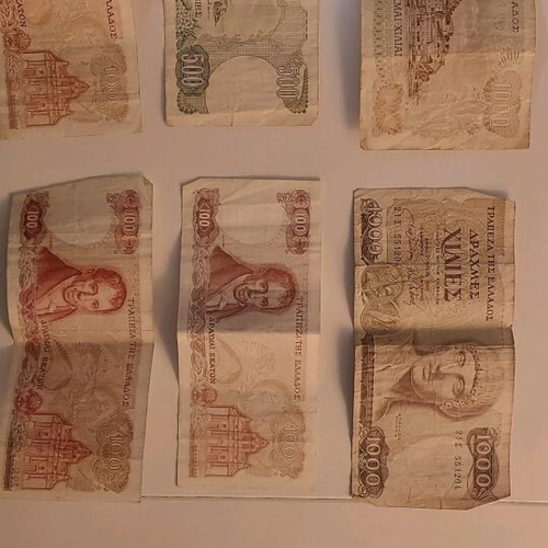 Greek and American paper money used