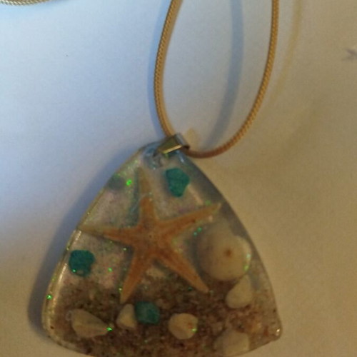 Handmade pendant with resin and beige sea elements new