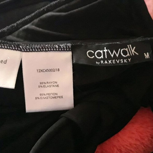 Catwalk women's black blouse medium new, timeless piece