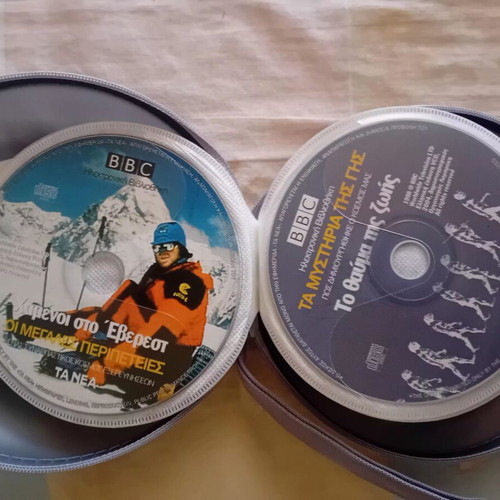 DVD collection like new, pack of 33 with movies, documentaries, and shows