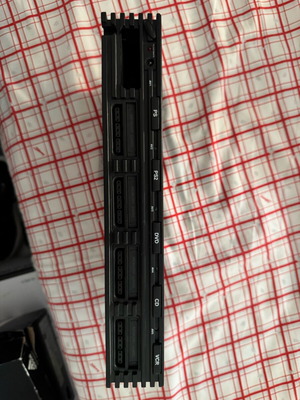 PlayStation 2 multitap like new with games holder