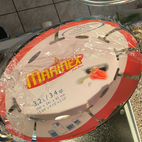 Stainless Steel Oval Serving Dish like new with Pyrex tray and lid