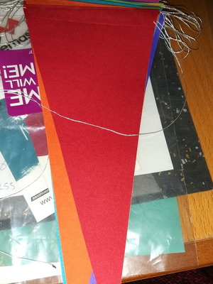 Decorative flags new with multicolor triangles and white string