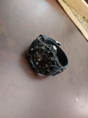 Unisex watch new with protective film, needs battery