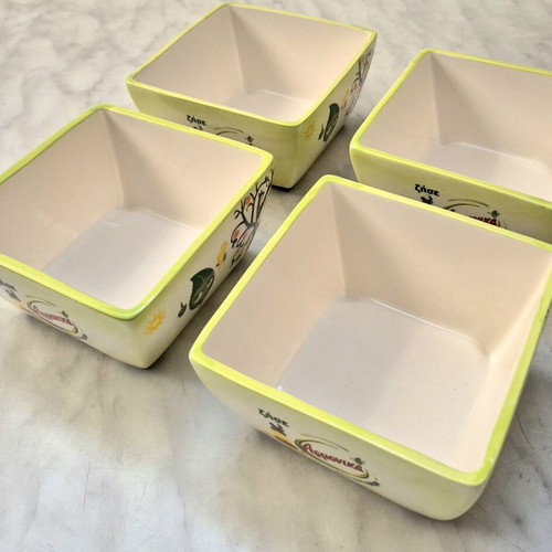 Ceramic bowls set of 4 new, light green with designs
