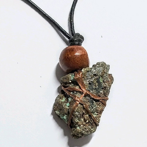 Pendant with pyrite new, gold copper wire and leather