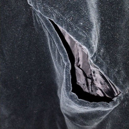 Velvet coat used with arm openings and gift bag