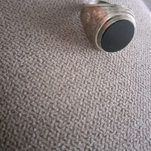 Silver ring with black stone like new