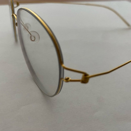 Glasses with ultralight titanium frame gold color, like new