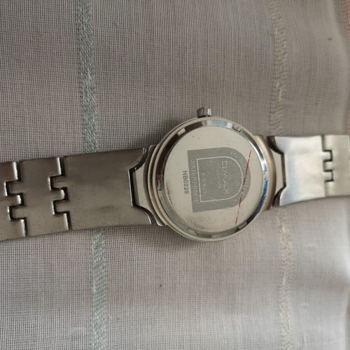 Vintage OMAX HB0239 women's quartz watch used, silver tone