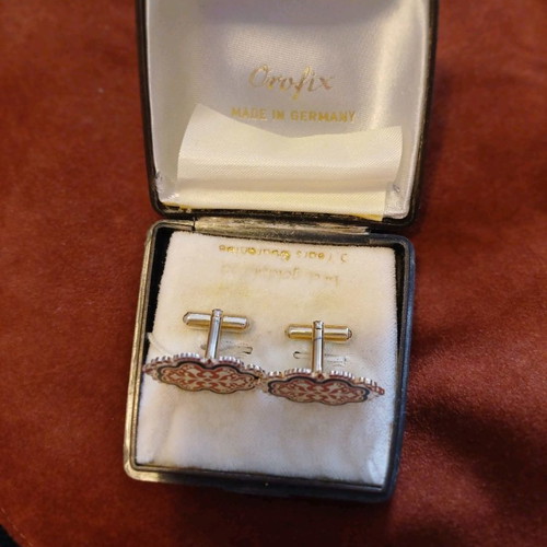 Orofix cufflinks used, vintage, embossed gold on coral background